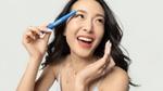 A photo of creator Jen Chae holding the Vaseline Originals Brow Tamer Jelly product she helped Vaseline design.
