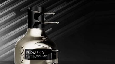 Cropped image of the top half of a gold bottle of Nexxus Promend hair treatment.