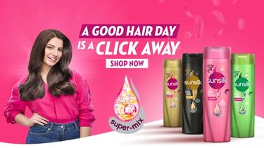 Four Sunsilk products next to a happy woman and a text that reads "A good hair day is a click away"