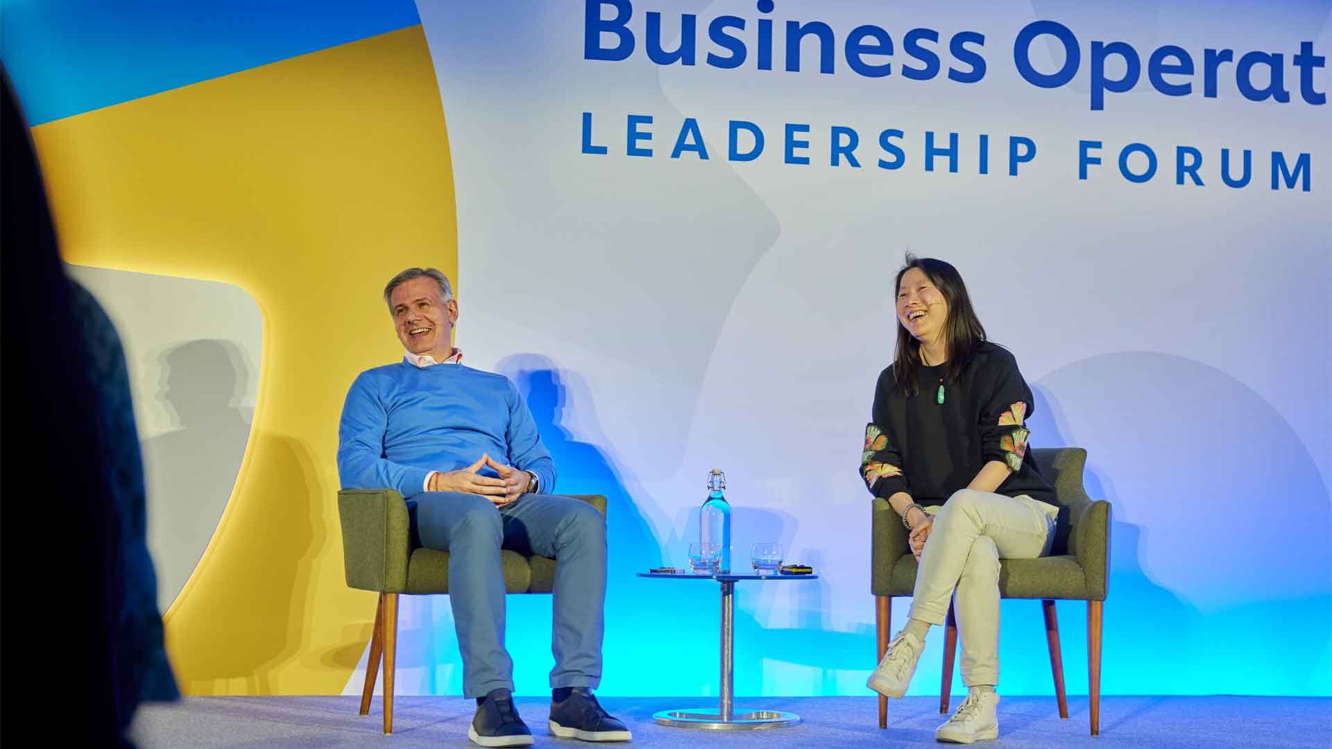 Reginaldo Ecclissato and panellist on stage at the Business Operations Leadership forum 