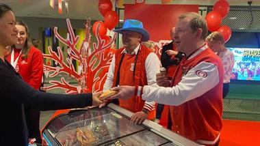 Matt Close with a Wall’s colleague handing out free ice creams on World Happiness Day