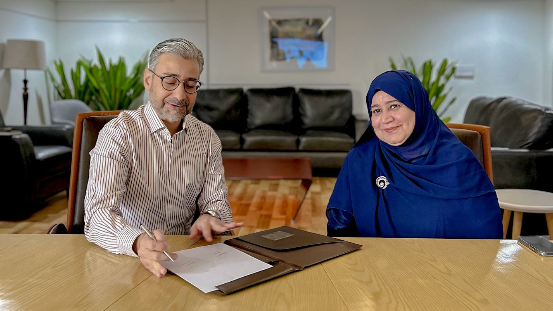 Amir Paracha CEO Unilever pakistan signing an MOU with TeeSquare for the education program in Thatta