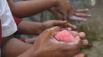 An image of a child washing hands with Lifebuoy soap
