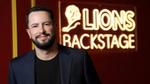Leandro Barreto at Cannes Lions 2026 in front of a ‘Lions backstage’ neon sign.