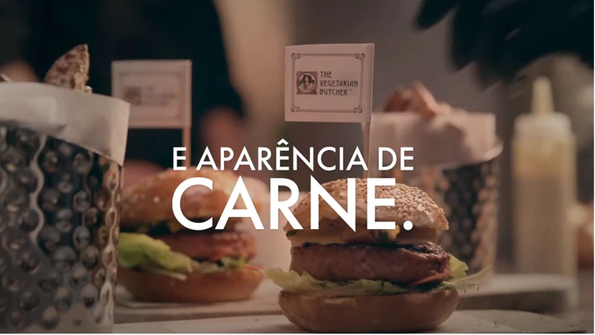 Burgers with The Vegetarian Butcher flags on a table   "