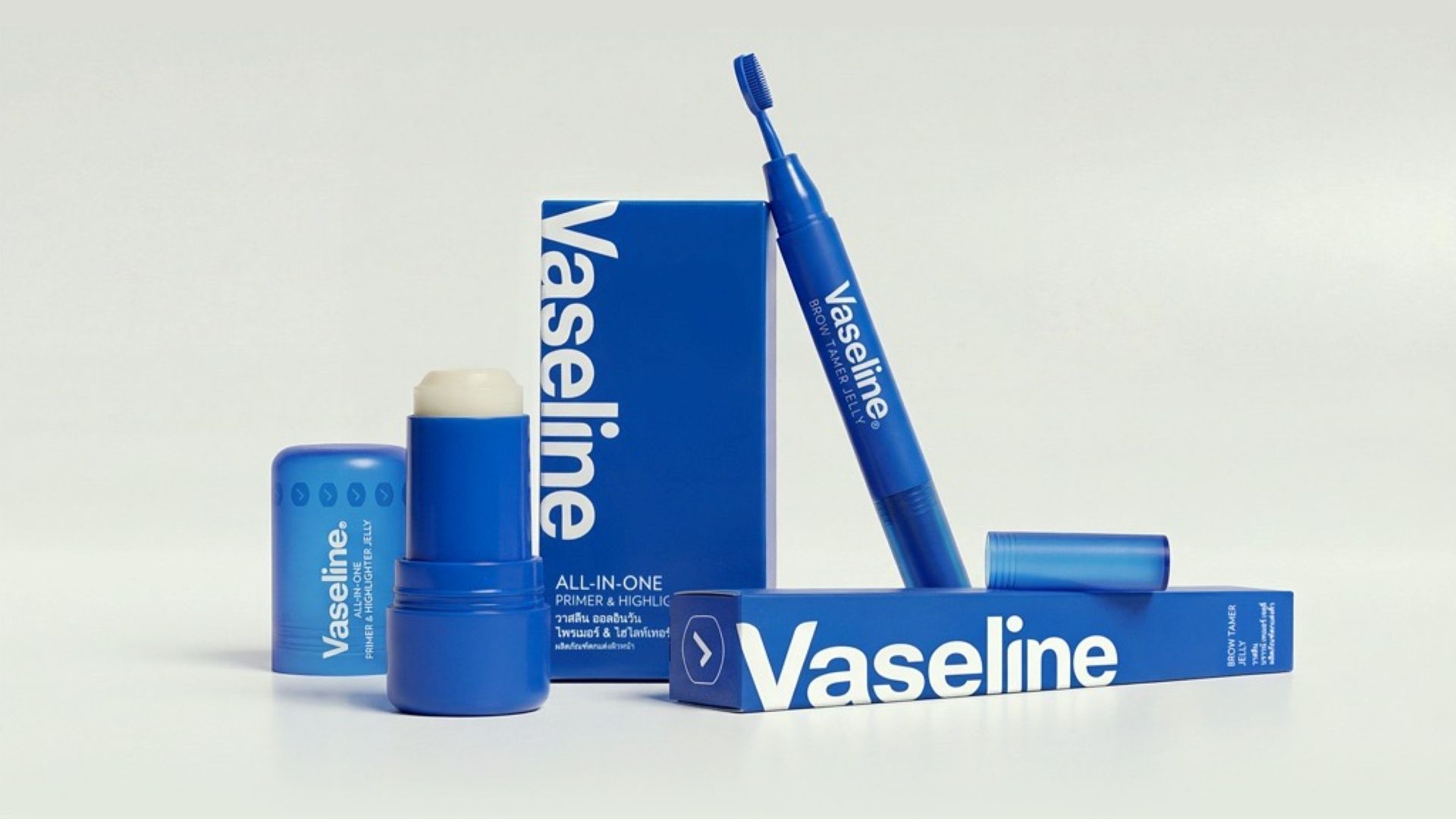 Vaseline Originals products: the Primer & Highlighter and the Brow Tamer Jelly. Both in blue packaging with white writing.