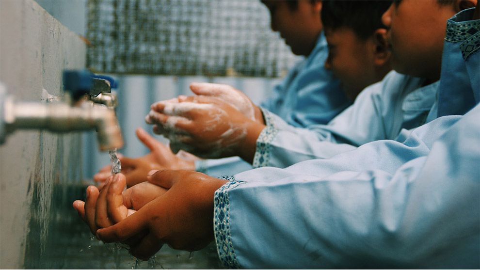 Children washing hands